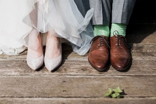 Bride & groom photo shows ankles and shoes